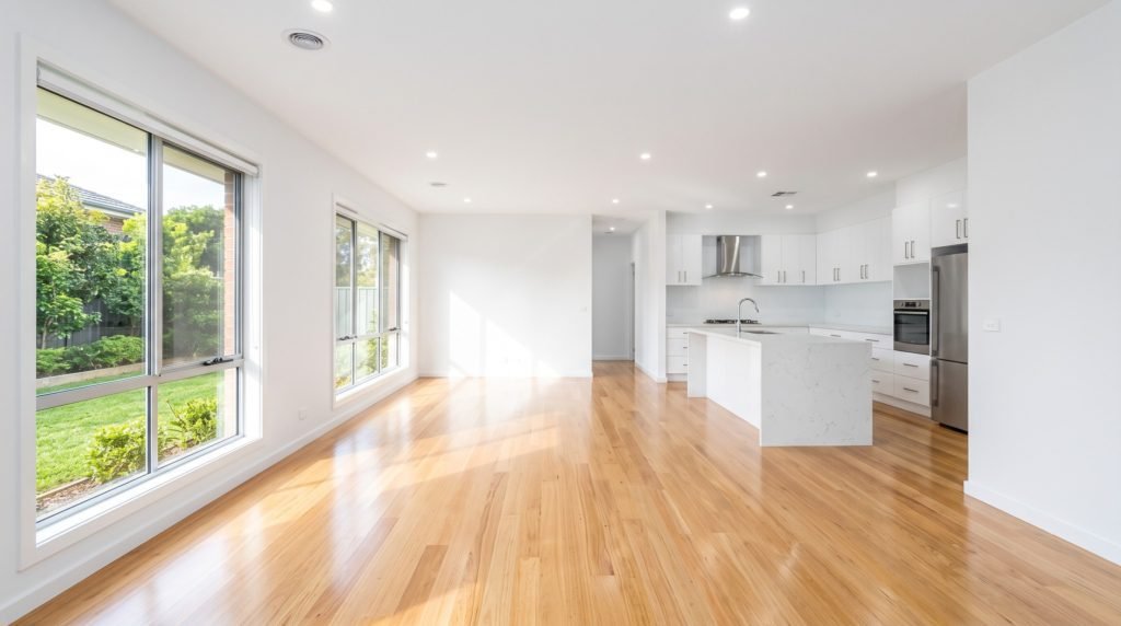 An immaculate, completely empty rental property living room ready for a final real estate inspection by bond back cleaning Gold Coast and Brisbane experts